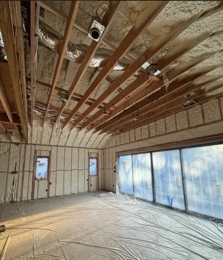Interior walls and ceiling insulated with spray foam during new construction in Richmond Heights